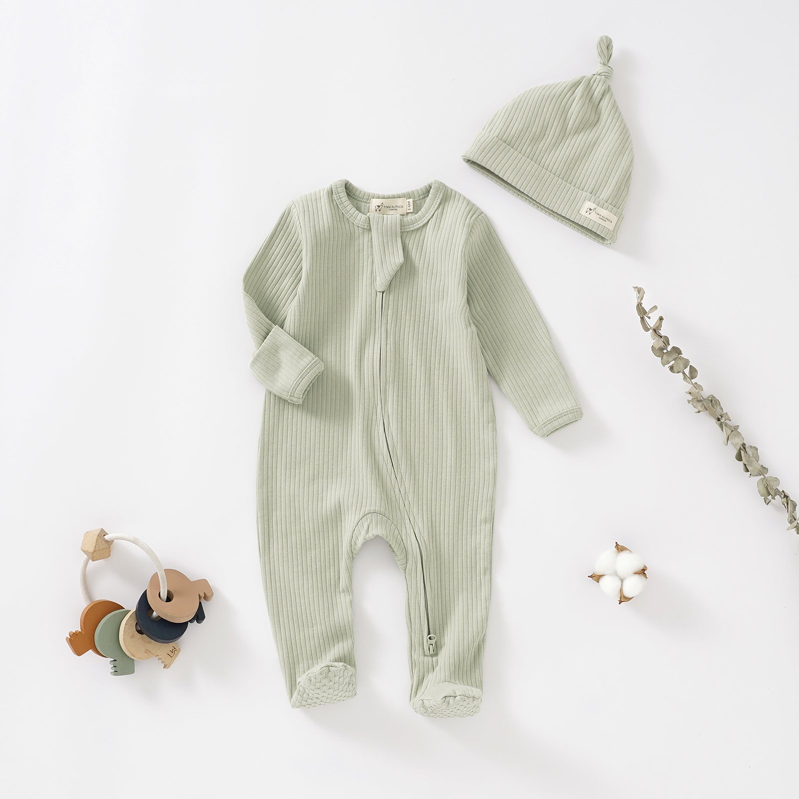 Baby sleepsuit and store hat